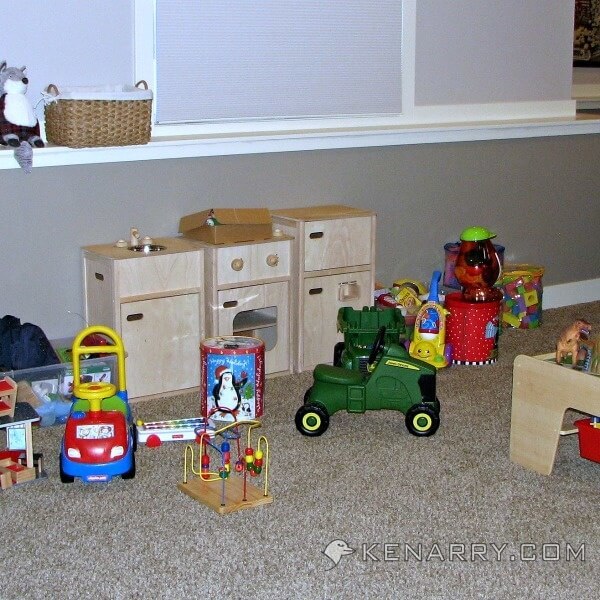 A disorganized toy room. 