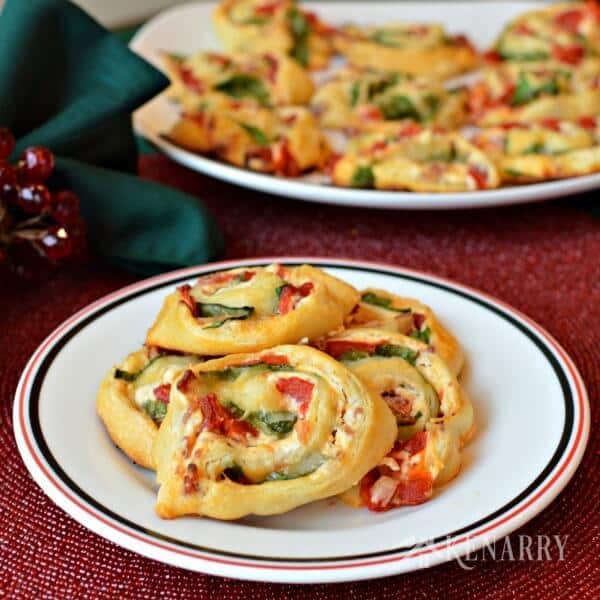 Great for Christmas cocktail parties - Bacon Spinach Blossoms with roasted red peppers and Italian cheeses are a festive holiday appetizer.