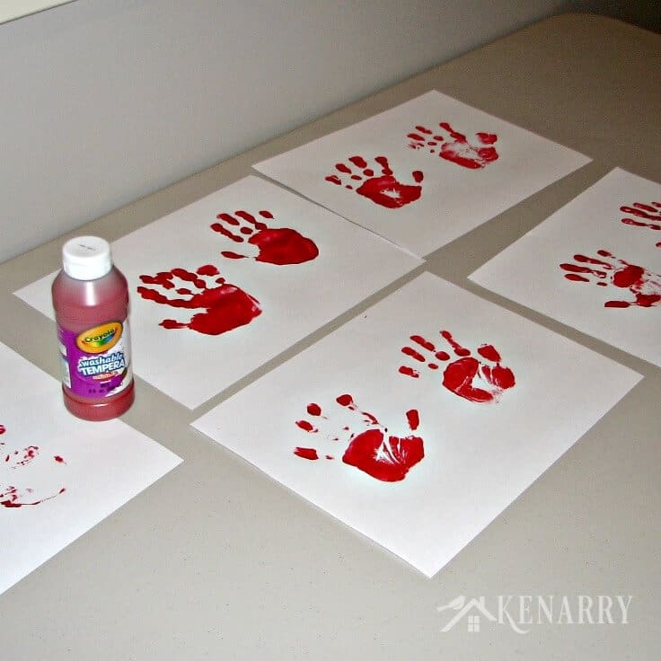 Looking for a great kid's valentine card idea to send to grandparents or other loved ones? Try sending a long-distance hug using your child's handprints!