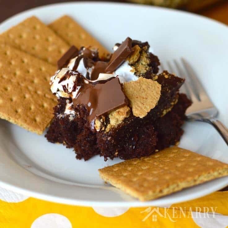 This recipe for S'mores Chocolate Fudge Cake with marshmallow and graham cracker is the next best thing to sitting by a campfire in the summer.