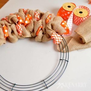 This is great! Easy step-by-step tutorial teaches how to make a burlap wreath using two different accent ribbons. Beautiful craft for holiday and everyday home decor!