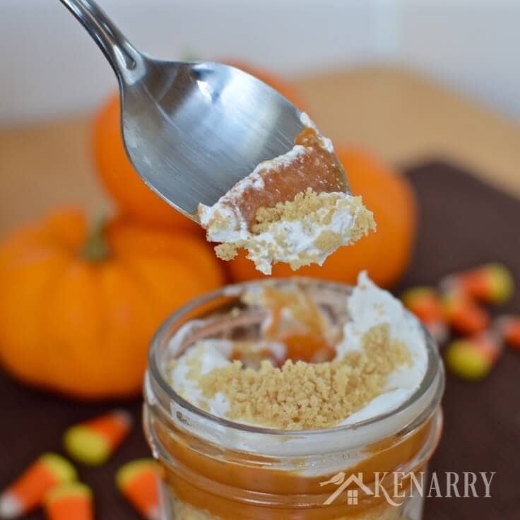 A spoon scooping out delicious pumpkin pie parfaits 