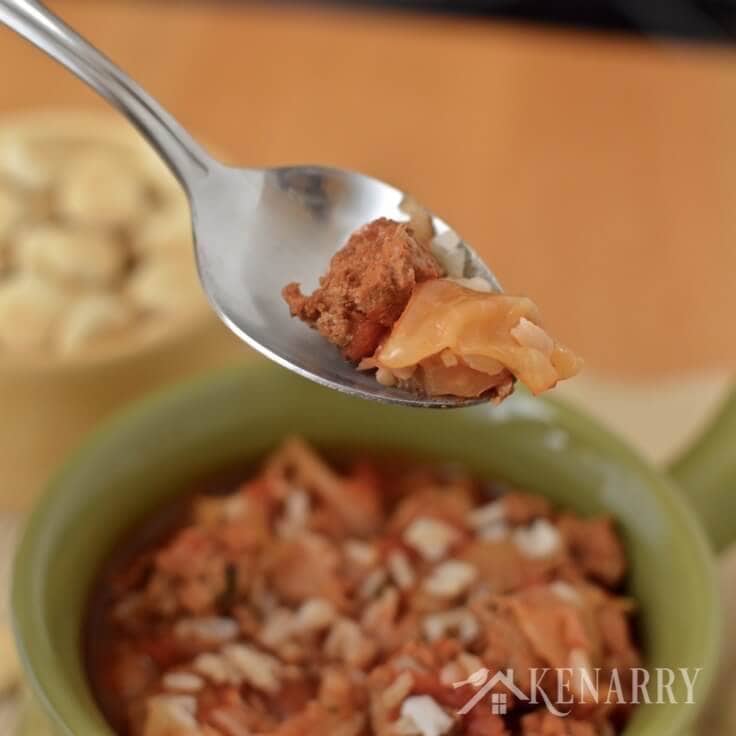 Yum! This Slow Cooker Cabbage Roll Soup is an easy dinner idea. It's a delicious Crockpot recipe made with ground turkey, rice and chopped cabbage, perfect for chilly fall and winter days. #soup #fallrecipes #kenarry