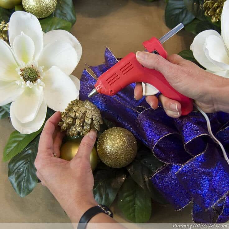 Learn to make a designer holiday wreath! Christmas is the perfect time to go big, go glittery, and get dramatic! Then finish with a big, loopy bow!