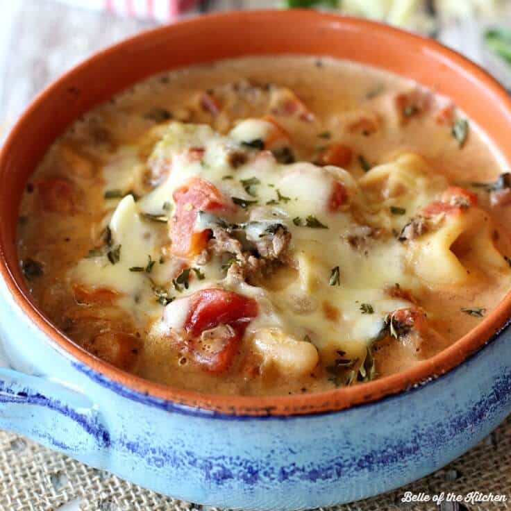 This Creamy Tortellini Fagioli Soup is a hearty and delicious soup full of meat, veggies, beans, and cheesy tortellini, all swimming in a creamy broth.