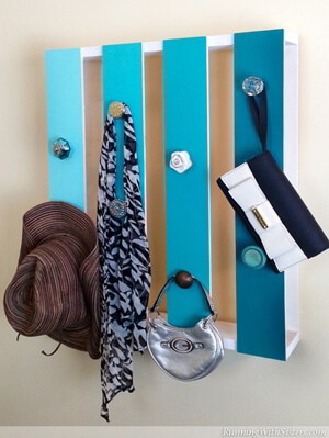 Turn a pallette into a coat hanger catch all!