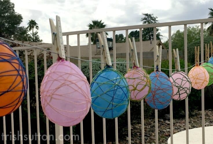Colorful DIY Spring Decor: String Easter Eggs can be used as a table centerpiece, placed on bookshelves individually or they can be strung as garland.
