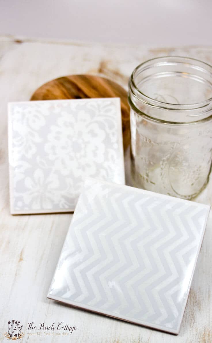 The Birch Cottage shares how to make coasters from ceramic tiles, Mod Podge, felt and a waterproof sealant. The perfect DIY decor accessory or handmade gift!