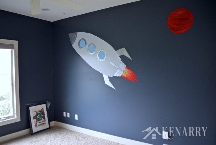 Love this idea for creating an outer space bedroom for boys! This tutorial makes it look easy to paint an outer space mural to decorate walls in your home.