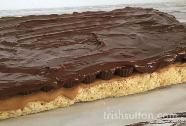 Melted chocolate on a layer of rice krispie treats