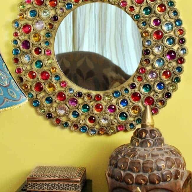 Learn how to make a bejeweled boho mirror out of cardboard