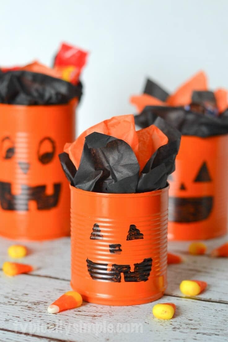Tin Can Pumpkins Craft Tutorial, an easy idea for a Halloween activity for kids or a party centerpiece.