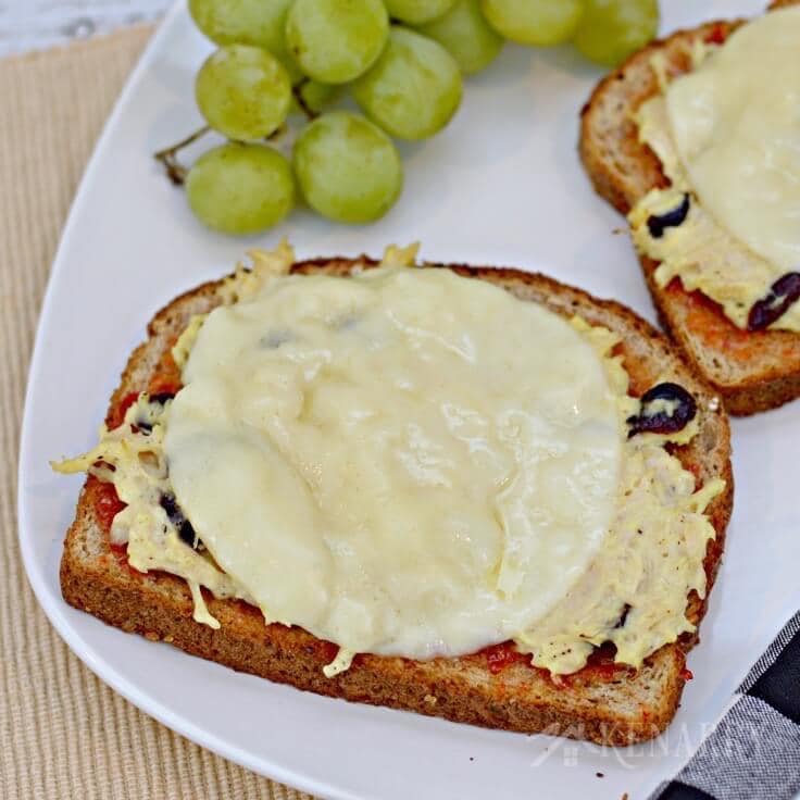 For an easy weeknight dinner idea, make this cheesy chicken melts recipe with canned chicken, red pepper jelly, dried cranberries and 100% real, natural sliced cheese from Sargento.