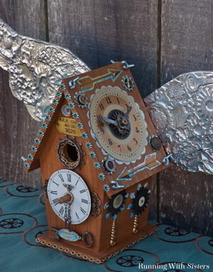 Make a Steampunk Birdhouse with old skeleton keys, clock parts, chains, and gears. We'll show you how to emboss the metal wings.