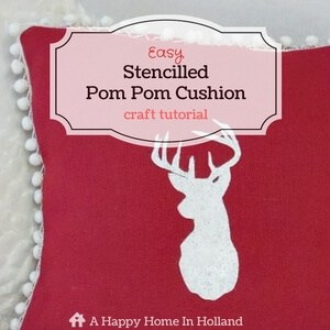 stencilled-pom-pom-cushion
