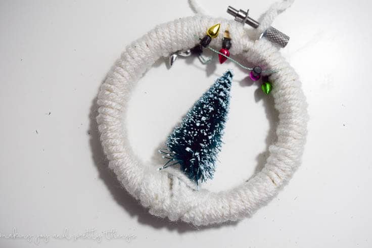 These Mini Embroidery Hoop Ornaments took only minutes to whip up and add a personalized touch to your Christmas Tree!