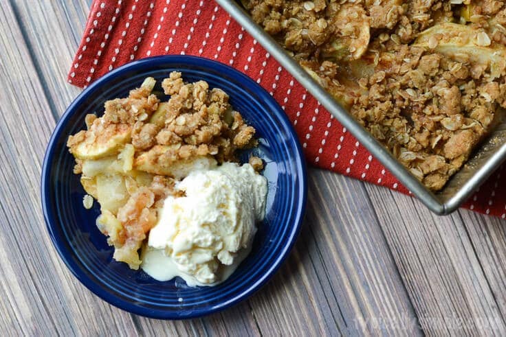 Easy apple crisp in a bowl with ice cream