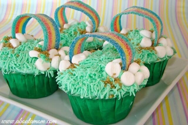 St. Patrick’s Day Rainbow Cupcakes – About a Mom - St. Patrick's Day Desserts featured on Kenarry.com