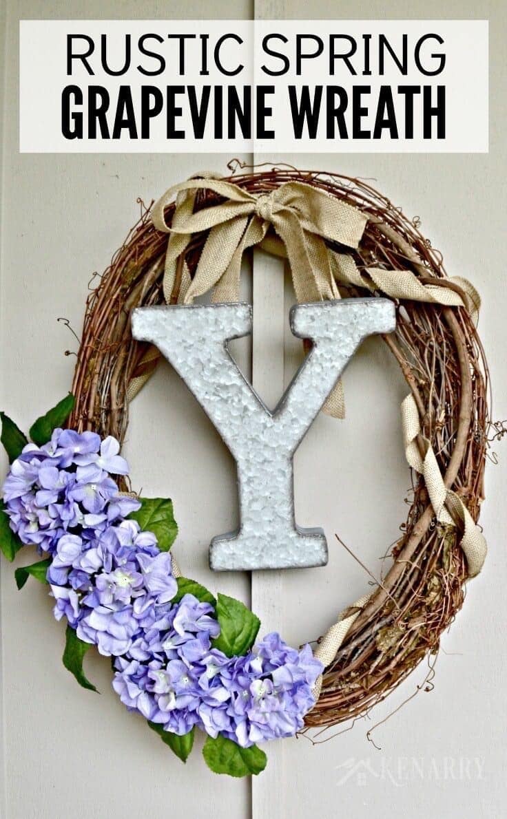 With a large industrial metal monogram and some rustic burlap ribbon this Spring Grapevine Wreath has that farmhouse style look that's so popular right now. This easy and beautiful craft idea will brighten up your front door all season long!