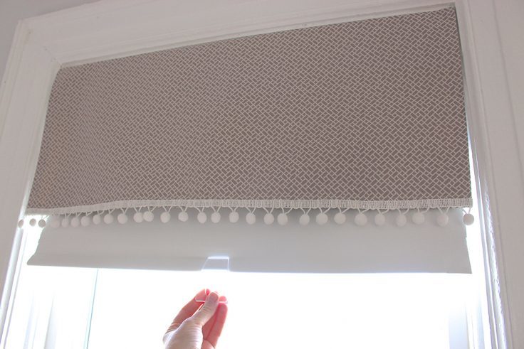 The roller blind behind the valance 
