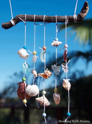 Make a seashell mobile as a souvenir of your summer trip to the beach. Collect seashells then string them with painted beads and sea glass. So pretty!