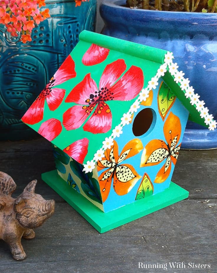Make a floral birdhouse! We'll show you how to decoupage with fabric and Mod Podge to make this pretty gift craft!