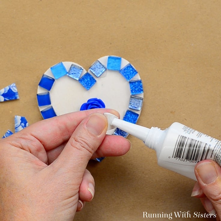 Make a Mosaic Heart with broken china tiles. In this video tutorial, we'll show you how to glue the tiles and how to mix the grout. Great for beginners!