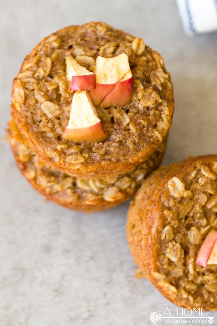 Baked Apple Pie Oatmeal muffins are a healthy treat or breakfast on the go that the whole family will love!