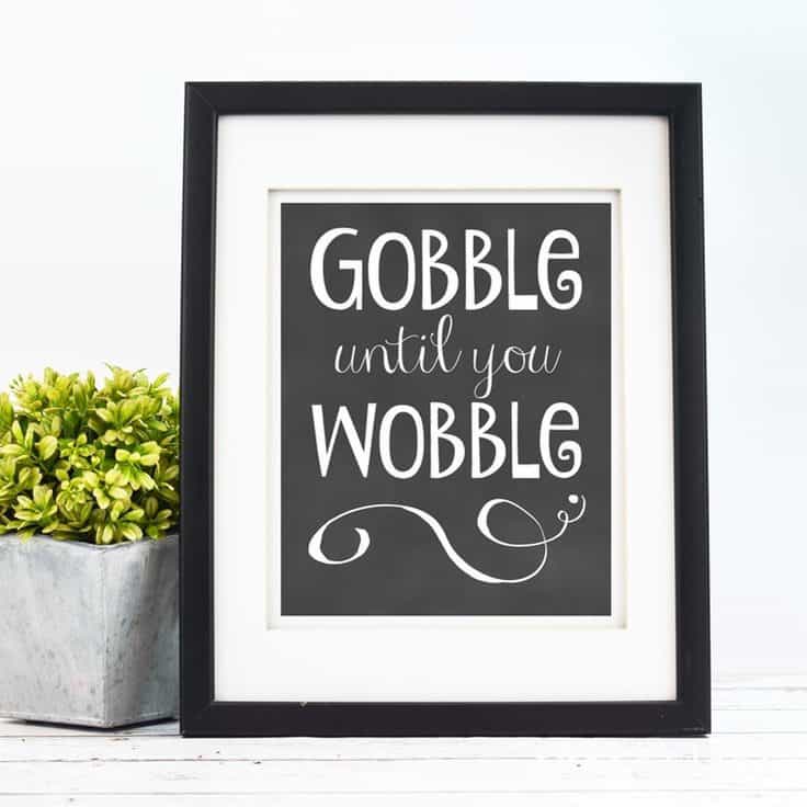 Eat, drink and be festive with this beautiful black and white Thanksgiving art in your kitchen or dining room. This free printable art from Kenarry.com will encourage you to Gobble Until You Wobble.