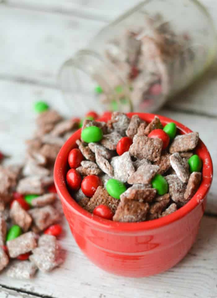 Christmas Muddy Buddies Recipe – Typically Simple - 14 Easy Dessert Recipes and Christmas Potluck Ideas featured on Kenarry.com