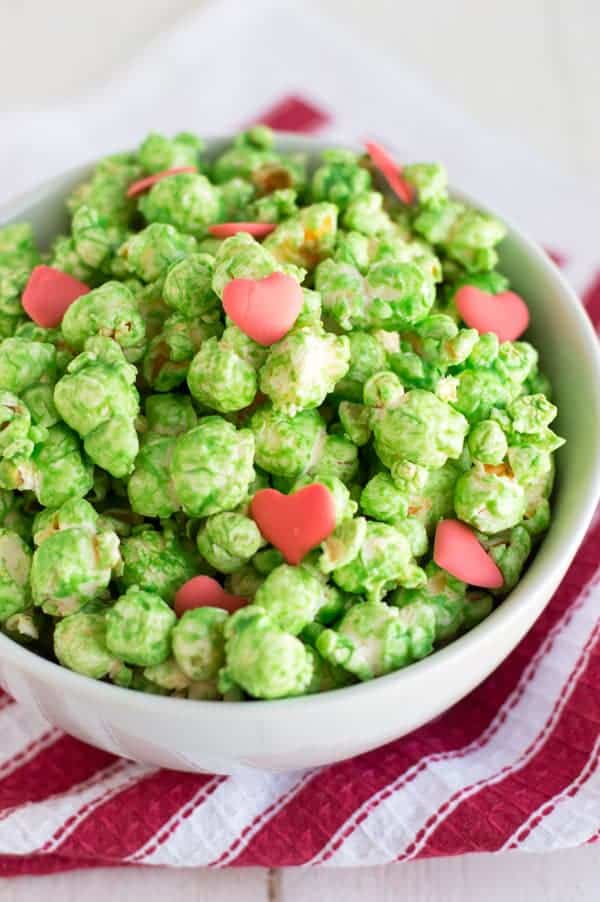 Grinch Popcorn – Cook. Craft. Love. - 14 Easy Dessert Recipes and Christmas Potluck Ideas featured on Kenarry.com
