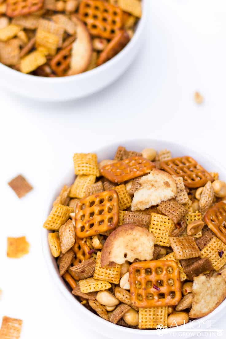 This spicy Sriracha Chex mix is the perfect appetizer or snack recipe for your next holiday get-together!