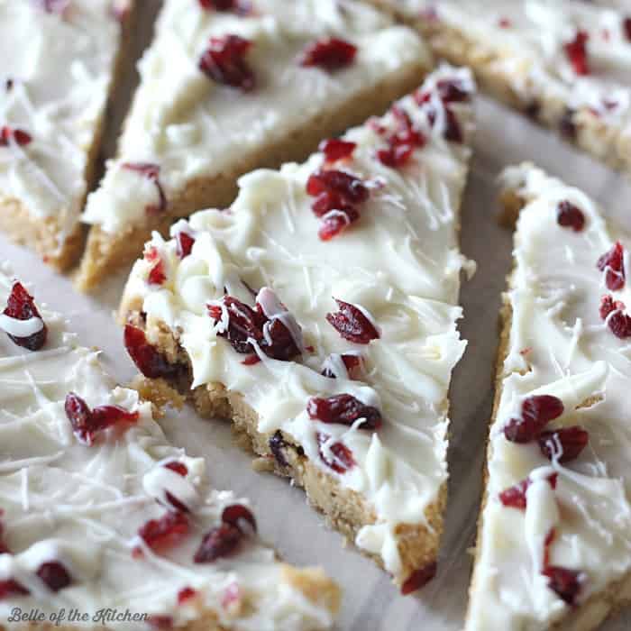 Cranberry Bliss Bars – Belle of the Kitchen - 14 Easy Dessert Recipes and Christmas Potluck Ideas featured on Kenarry.com