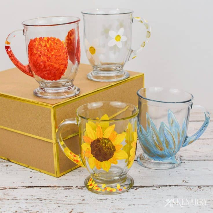 These four DIY coffee mugs each have a different flower design hand painted on the side using gloss enamel craft paints. It's easy to do with this tutorial.