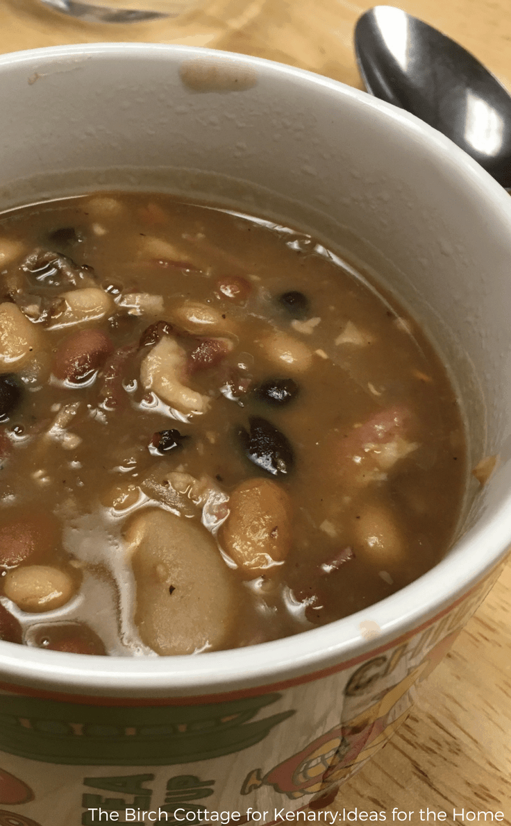Learn how to make this healthy Instant Pot Ham Bone and 15 Bean Soup recipe! Nothing warms you up on those cold fall or winter nights quite like a bowl of hearty, homemade mixed bean soup, especially when you can make it in about an hour in your Instant Pot or electric pressure cooker. #easysoup #intantpot #kenarry