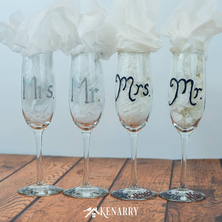 These Mr. and Mrs. toasting glasses are an easy DIY gift for the bride and groom. Personalized hand painted champagne flutes are the perfect DIY gift for a bridal shower, wedding or anniversary. #weddinggifts #weddingideas #weddingreception #handpainted