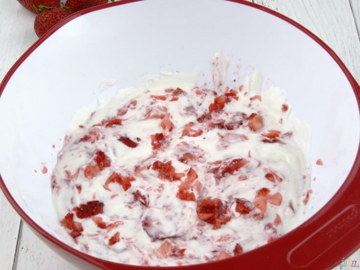 Strawberry Vanilla Yogurt Popsicles fold strawberries into yogurt