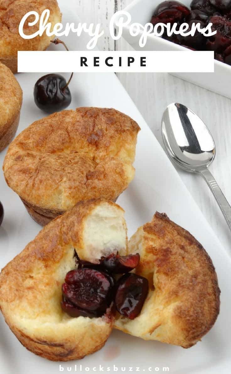 popovers with cherries on a white serving tray
