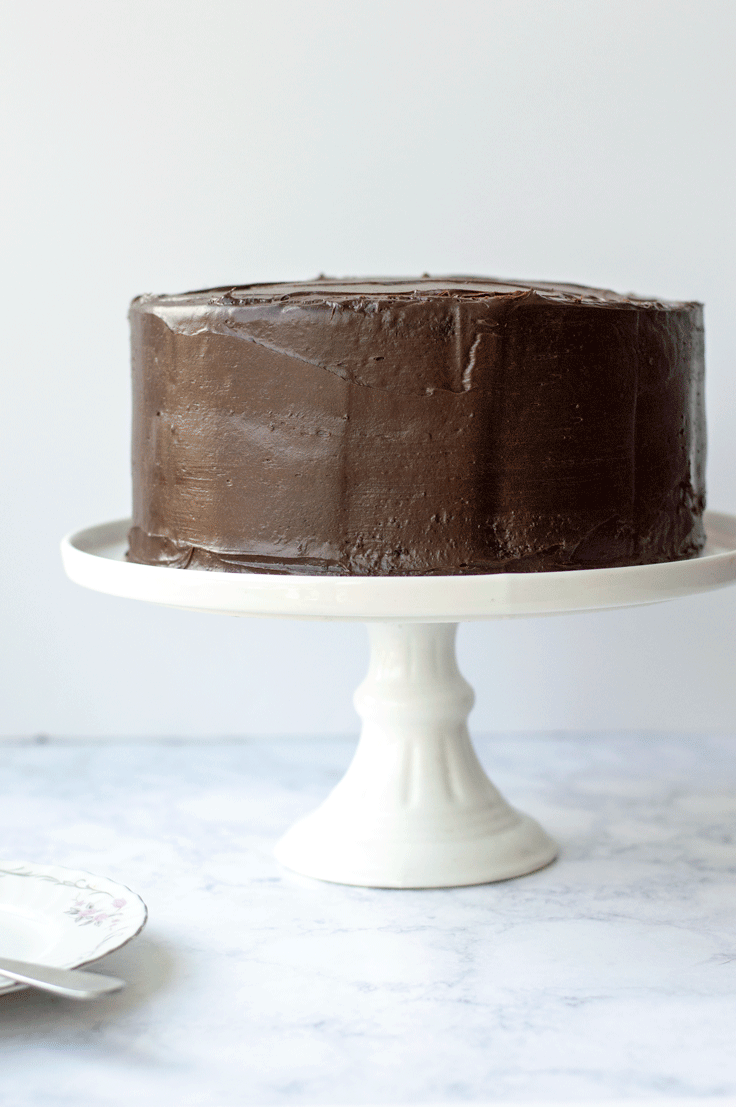 The ultimate chocolate cake recipe is something that you always want to have in your back pocket. But this delicious chocolate cake is from a doctored chocolate cake mix. And your friends or guests will never be able to tell! #dessert #recipe #chocolate #cake #chocolatecake