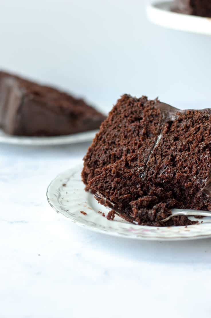 The ultimate chocolate cake recipe is something that you always want to have in your back pocket. But this delicious chocolate cake is from a doctored chocolate cake mix. And your friends or guests will never be able to tell! #dessert #recipe #chocolate #cake #chocolatecake