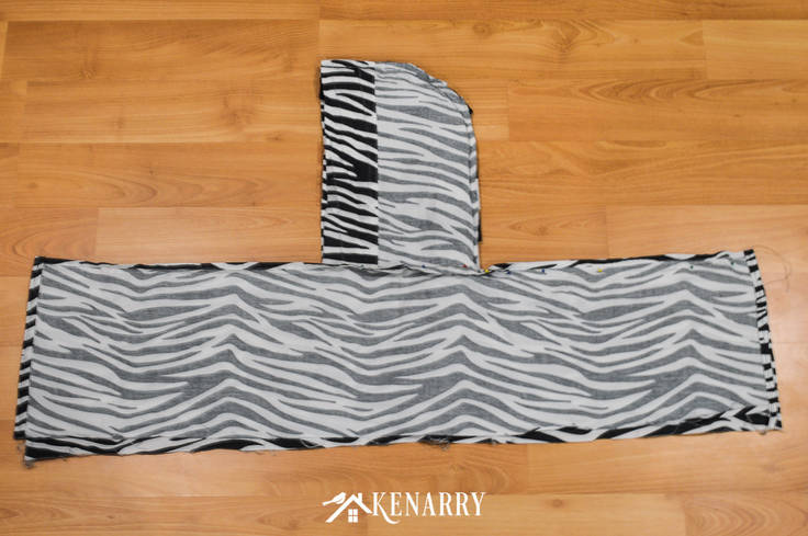 Use black and white zebra print fabric to create a vest that a child can wear as a kids zebra costume for Halloween or to play dress-up as a jungle animal.