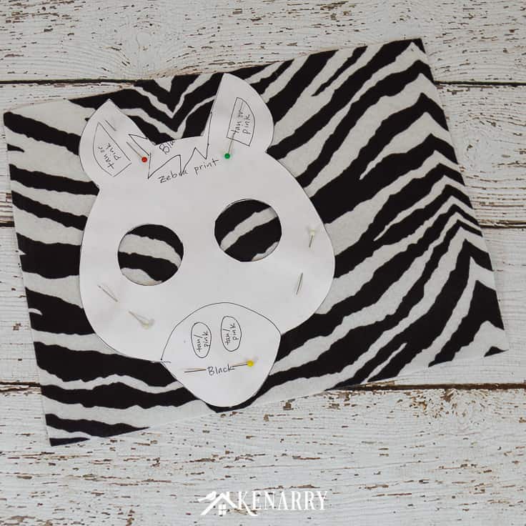 Use zebra print felt to make an easy zebra mask for a kids zebra costume for Halloween or animal dress-up.