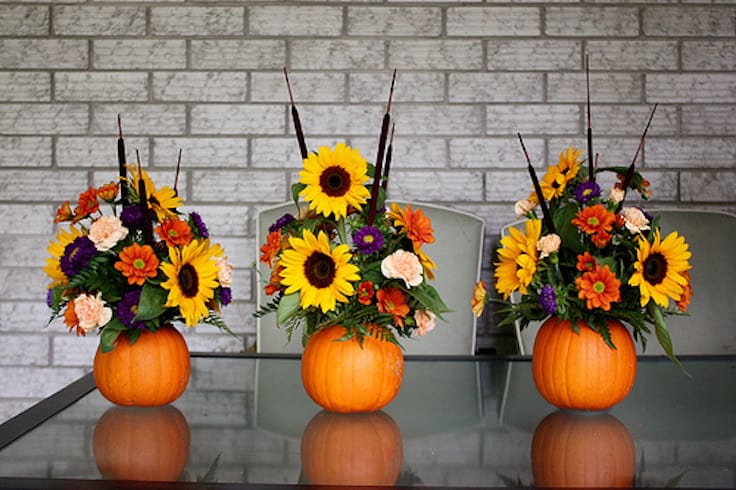 decorate for flowers with pumpkin vases