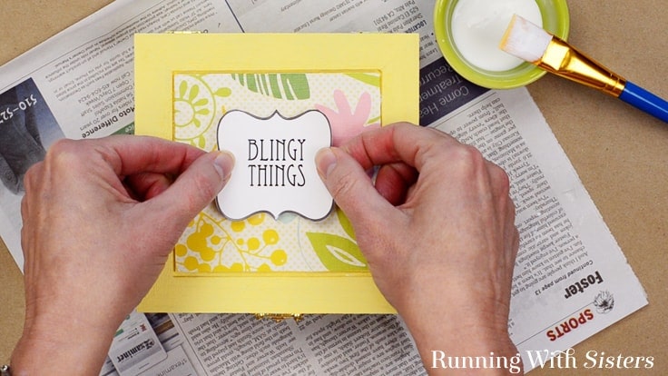 Make an Easy Jewelry Box with a cute label. We'll show you how to decoupage the box with scrapbook paper and a cute downloadable "Blingy Things" label.