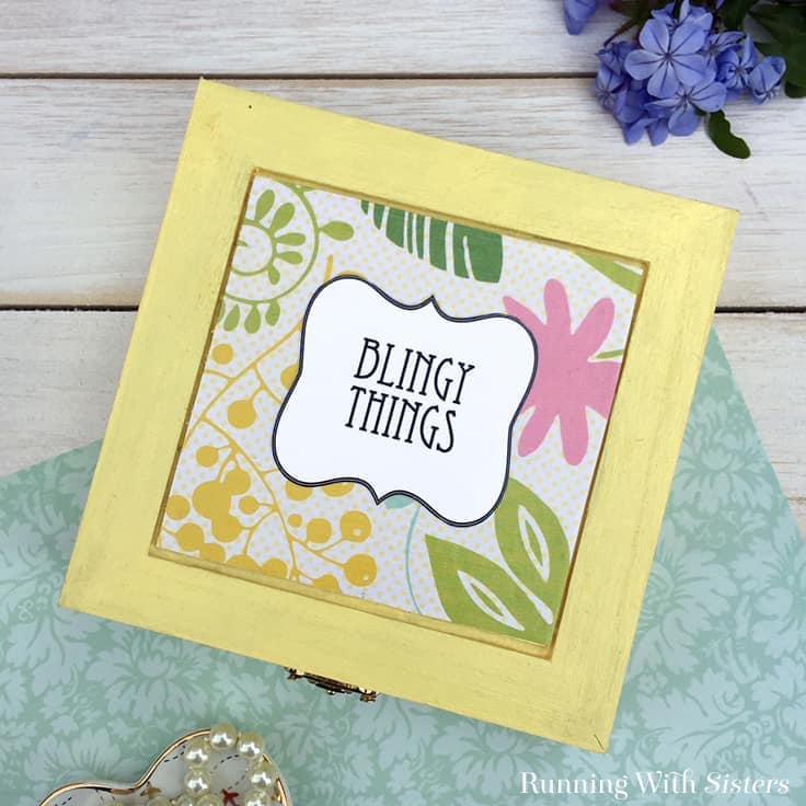Make an Easy Jewelry Box with a cute label. We'll show you how to make a DIY decoupage wooden jewelry box with scrapbook paper and a cute downloadable "Blingy Things" label. Add this to your list of cute homemade gift ideas! #diyjewelrybox #homemade