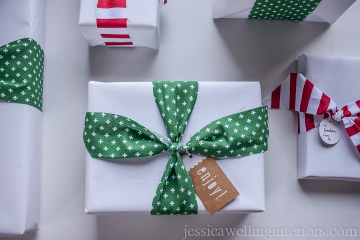 Need some Christmas gift wrapping ideas? Try solid white or brown paper with DIY fabric ribbon! It's a simple and easy way to wrap beautiful presents for Christmas!
