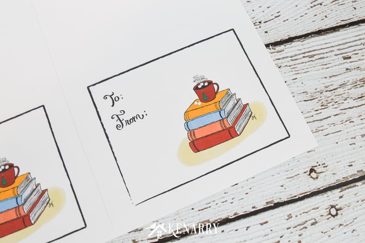A close up of a card with blank to and from fields. Clip art of hot chocolate on top of a stack of books. This makes a cute card for giving gift cards. 