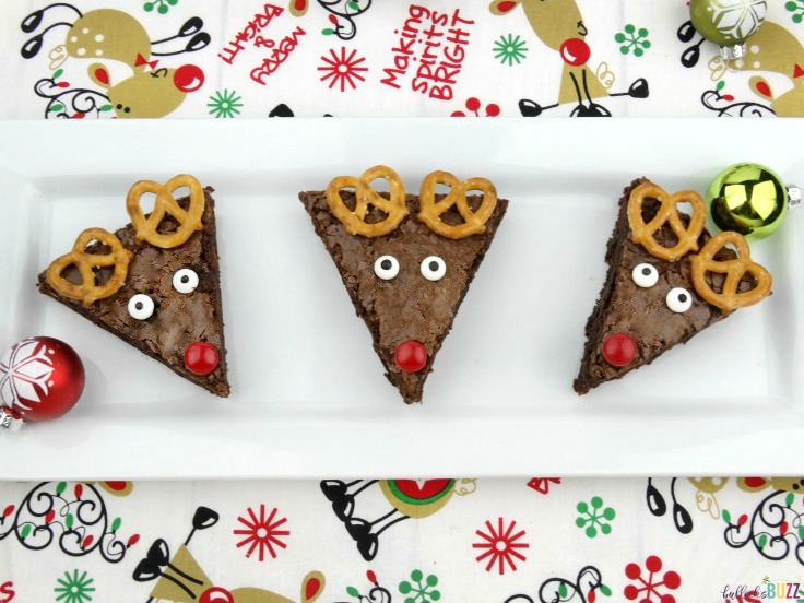 Dress up your holiday table at your next party with these cute and creative homemade Reindeer Brownies! They're easy to make, fun to decorate and deliciously sweet! #christmasdesserts #christmasrecipes #kenarry