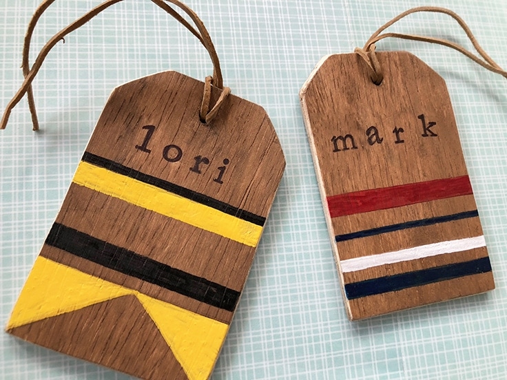 Learn how to make a unique rustic wooden DIY luggage tag to add a personalized flair to your bags and help make them easy to recognize when you travel. #luggagetags #crafts #kenarry