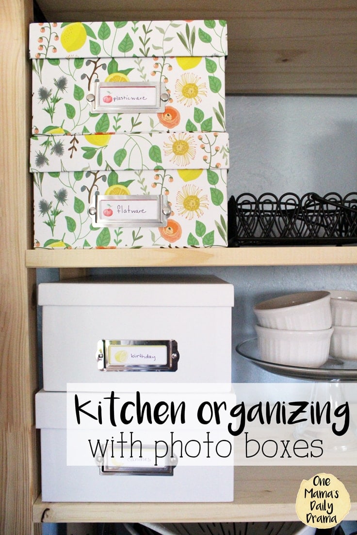 Using open shelving can be pretty and practical for kitchen organization and decor. All you need are a few photo boxes and some printable labels to not only hide the clutter in the kitchen but make it easy to find when you need it. #kitchenorganization #openshelves #kenarry